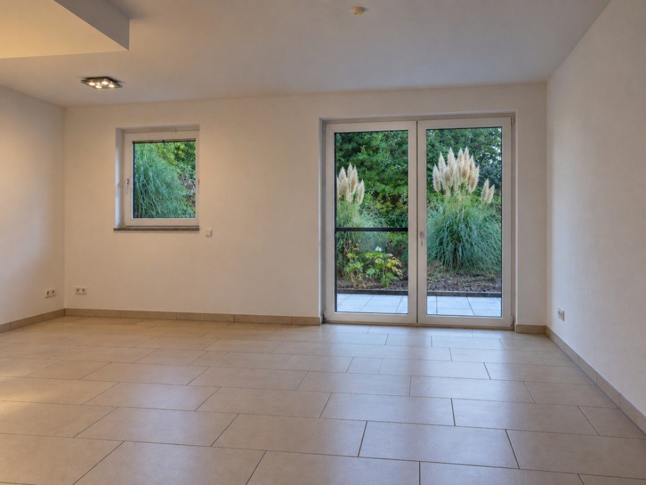 NEU zur Vermietung in Velbert-Langenberg - Wohnzimmer - Reuter Immobilien - Immobilienmakler Souterrainwohnung Velbert