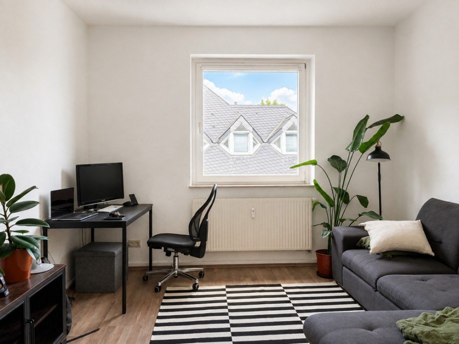 NEU zur Vermietung in Bochum Mitte - Wohnzimmer - Reuter Immobilien - Immobilienmakler Etagenwohnung Bochum