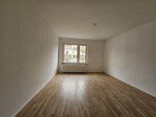 NEU zur Vermietung in Herne Eickel - Wohnzimmer - Reuter Immobilien - Immobilienmakler Stadtwohnung mit Charakter - 3,5 Zimmer zum Verlieben